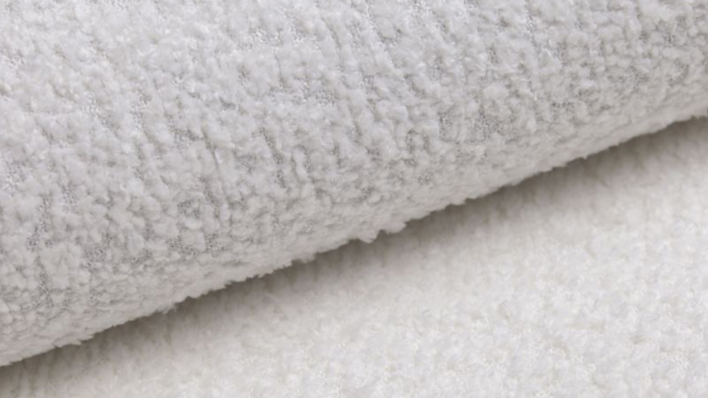Canapé d'angle à droite panoramique modulable convertible 10 places avec pouf en tissu bouclé beige - Harper Mod